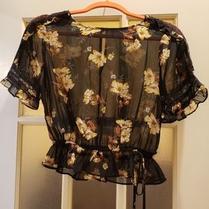 Adorable sheer black top